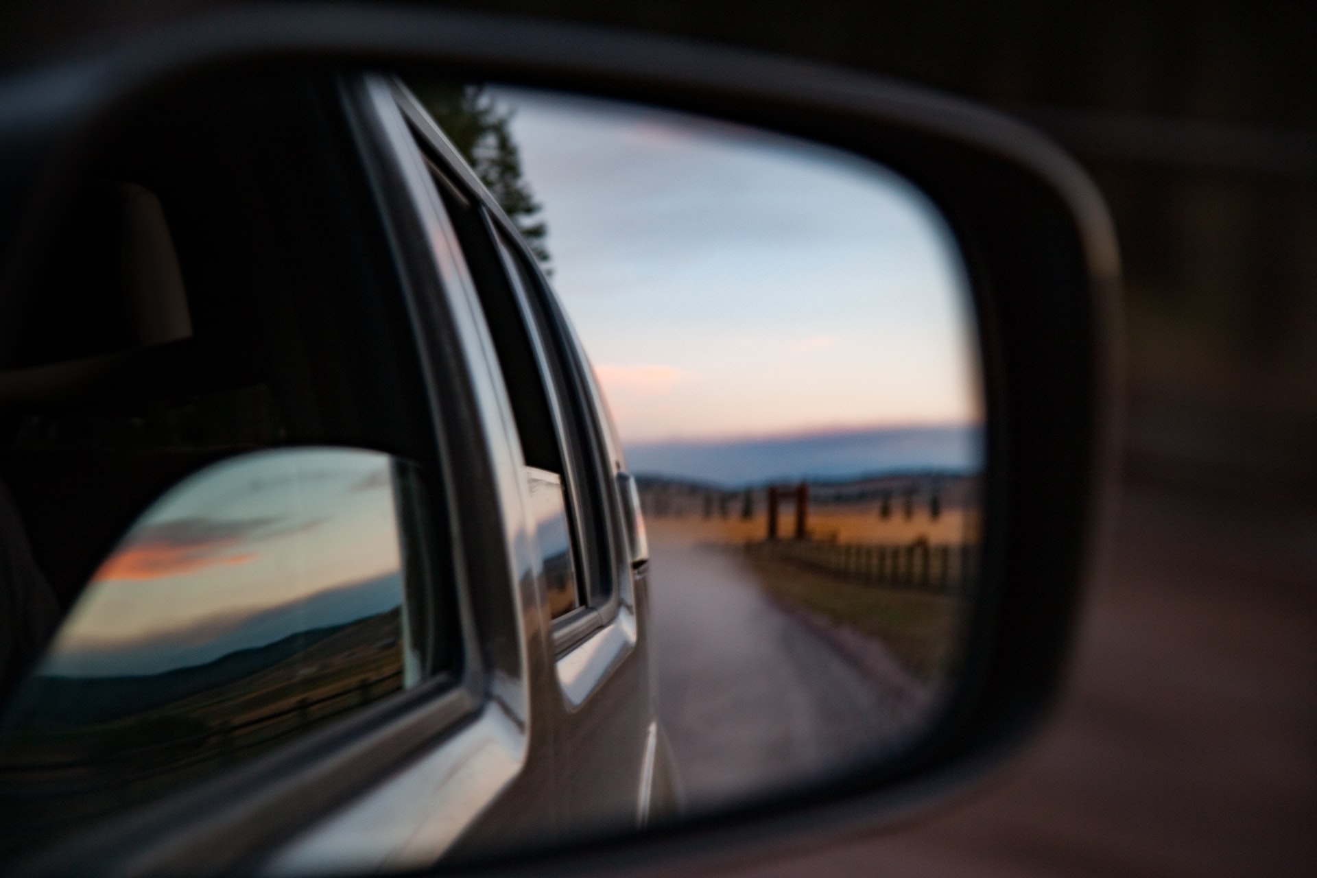 Photo of a rear view mirror on a car